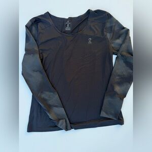On Running Women’s Black Long-Sleeve Athletic Tee with Subtle Logo